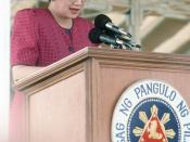 English: Philippine President Corazon Aquino addresses base workers at a rally at Remy Field concerning jobs for Filipino workers after the Americans withdraw from the U.S. facilities. (Released to Public)
