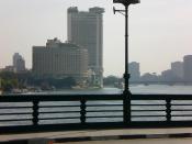 English: The district on , the Grand Hyatt Cairo, and the Nile, seen from the downtown .