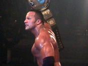 English: The Rock as WWF Champion.