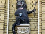 English: A sculpture of the cat Behemoth from the novel The Master and Margarita, on a wall in Andriyivskyy Descent, Kyiv. Français : Cat Béhémot, personnage de 