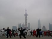 The Chinese martial arts Taijiquan being practiced on the Bund in Shanghai.