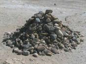 English: Pile of rocks started by Nelson Mandela and added to by former prisoners of Robben Island Prison, South Africa