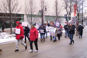 English: Members of the Service Employees International Union march towards the Wisconsin State Capitol in protest of Governor Scott Walker's collective bargaining restriction on unions.