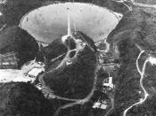 View of Arecibo Observatory in Puerto Rico with its 300 m dish- the world's largest. A small fraction of its observation time is devoted to SETI searches.