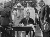 Coolidge signing the Immigration Act and some appropriation bills. General John J. Pershing looks on.