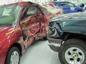 Crash test between a 1996 Ford Explorer and 2000 Ford Focus photographed at the Insurance Institute for Highway Safety Vehicle Research Center. Category:Ford_Focus_NA_Gen._I Category:Ford_Explorer_(second_generation) Category:Crash tests