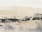A wrecked German ammunition train, destroyed by shell fire, World War I