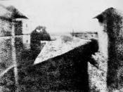 View from the Window at Le Gras, the first successful permanent photograph created by Nicéphore Niépce in 1826 or 1827, in Saint-Loup-de-Varennes. Captured on 20 × 25 cm oil-treated bitumen. Due to the 8-hour exposure, the buildings are illuminated 