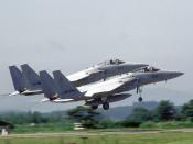 Two F-15J Eagle aircraft of the 202nd Tactical Fighter Squadron, Japanese Air Self Defense Force (JASDF), take off in formation during the joint U.S./Japan exercise Cope North 85-4. Location: NYUTABARU AIR BASE, KYASHU JAPAN (JPN)