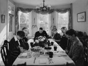English: Saying grace before carving the turkey at Thanksgiving dinner in the home of Earle Landis in Neffsville, Pennsylvania