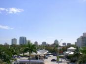 English: Digital photo taken by Marc Averette. Skyline of Coconut Grove, Miami, Florida as seen from respective Metrorail station. 3/5/2007.