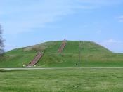 Monk's Mound a Pre-Columbian Mississippian culture earthwork, located at the Cahokia site near Collinsville, Illinois. The concrete staircase is modern, but it is built along the approximate course of the original wooden stairs.