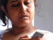 Subrata Ganguly, a thirty six years old lady using her Nokia 1100 cell phone.
