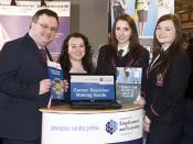 Dr Stephen Farry at UCAS Higher Education Convention with Careers Adviser, Bernie O'Brien, and Wallace High School pupils, Kelly McComb and Rhyanna Hunter