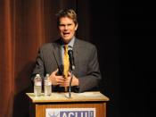 English: Mike German, former FBI agent, now National Security Counsel of the American Civil Liberties Union (ACLU), speaking at Broadway Performance Hall, Seattle, Washington.