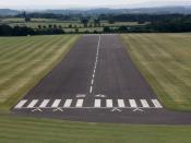 English: A view of runway 24 at RAF Cosford, Shropshire, UK, whilst on final approach in a Grob Tutor T1 of UBAS.