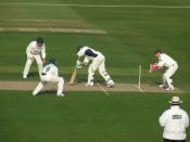 Two close fielders playing for Nottinghamshire in a County Championship match against Leicestershire at Trent Bridge. Bilal Shafayat (near) is at Silly mid-on and Jason Gallian (far) is at Silly mid-off. The batsman is HD Ackerman and Chris Read is keepin