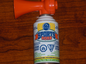 English: A common sports air horn used for sporting events, motorboating, or safety.