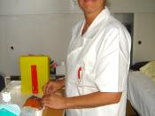 A nurse working in a hospital, is expected to express positive emotions towards patients, such as warmth and compassion.