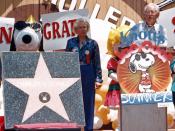 English: Charles M. Schulz receives his star on the Hollywood Walk of Fame in a ceremony at Knott's Berry Farm in Buena Park. Marion Knott stands between Schulz and Snoopy.