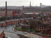 A view over Broadway in Chadderton, towards Werneth and Oldham, all in Greater Manchester, England. Raven Mill off to the left, with Nile & Chadderton Mills behind. Centre is the hulk of Hartford Mill. Also visible is Anchor Mill in Westwood, Oldham. On t