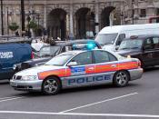 MPS officers responding to an emergency call in a police car in 2005