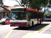 A SBS Transit Scania L94UB nearing Bras Basah MRT Station, Singapore.