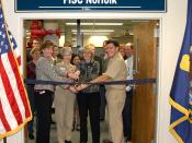 English: NORFOLK (Dec. 16, 2009) Cutting the ribbon at the opening of the Fleet and Industrial Supply Center Norfolk Strategic Sourcing Office, from left to right: Donna Reuss, deputy director of contracting, Capt. Ruth Christopherson, commanding officer,