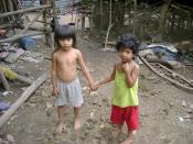 Picture of siblings living in extreme poverty in El Salvador.