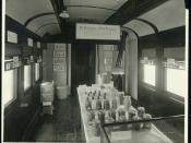 Exhibit car of Victory Special in 1919. Interior showing exhibit of canned goods. Troy photo.
