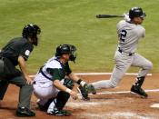 Jeter connects for a hit against the Tampa Bay Devil Rays.