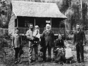 English: Perren family portrait, Nambour, ca.1890 Family portrait of the Perren Family outside the first pit sawn timber house along Rosemount Road, Nambour, opposite the old Glen Lawn tennis courts. Family members from right to left are: John Perren; Est