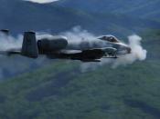 A U.S. Air Force A/OA-10 Thunderbolt II from the 355th Fighter Squadron is surrounded by a cloud of gun smoke as it fires a 30mm GAU-8 Avenger Gatling gun over the Pacific Alaska Range Complex in Alaska on May 29, 2007. The seven-barrel Gatling gun can be