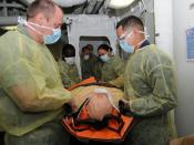 English: SAN DIEGO (Aug. 19, 2010) Sailors aboard the amphibious assault ship USS Makin Island (LHD 8) transport a simulated patient infected with a contagious disease from an experimental isolation unit during a Limited Objective Experiment. The 3rd Flee