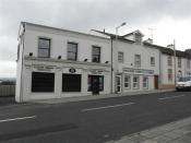 English: Claudy Credit Union Ltd / Mulhern Kerr Group Insurance They are located at Main Street, Claudy