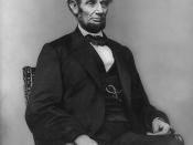 Abraham Lincoln, three-quarter length portrait, seated, facing right.