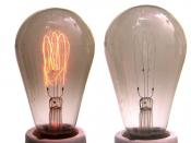 carbon filament lamp, grey coloured bulb results from sublimated carbon, which has been deposited at the inner glass surface