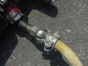 English: close-up of hose coupling for pneumatic drill / jackhammer air hose