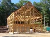 English: A rough-sawn hemlock timber frame horse barn located in Weston, MA just after it was raised.