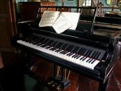A grand piano with music