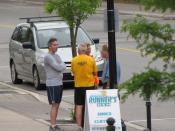 English: People engaging in casual conversation on a sidewalk in Owen Sound, Ontario, Canada.