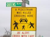 Pedestrian crossing sign on Queens Boulevard in Elmhurst