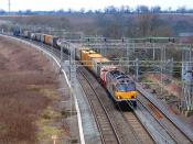 Class 92 hauled container-freight train on the West Coast Main Line near Nuneaton, Warwickshire