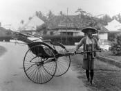 Nederlands: Repronegatief. Rikshaw, voortgetrokken door een chinese man, Medan Caption: A Chinese rickshaw puller posing with his rickshaw in Medan :(Note: he is not actually pulling the rickshaw in the photo, so I have put 