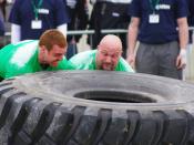 English: Strongmen event: the 2-Man Tire Flip (left James Fennelly, right Dave Warner).