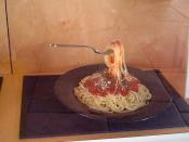 Plastic sample of spaghetti tomato sauce