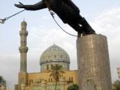 Statue of Saddam Hussein being toppled in Firdos Square after the US invasion of Iraq. Found on the US military website. CAPTION:The statue of topples in Baghdad's Firdos Square on April 9, 2003. Three years later, Iraqi forces increasingly are taking the