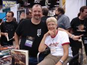 English: Tracy Hickman and Margaret Weis in the exhibit hall at Gen Con 2008.
