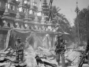 THE BRITISH ARMY IN BURMA DURING THE SECOND WORLD WAR, Two British soldiers on patrol in the ruins of the Burmese town of Bahe during the advance on Mandalay.