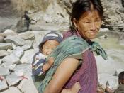 English: A Nepalese woman and her infant child.
